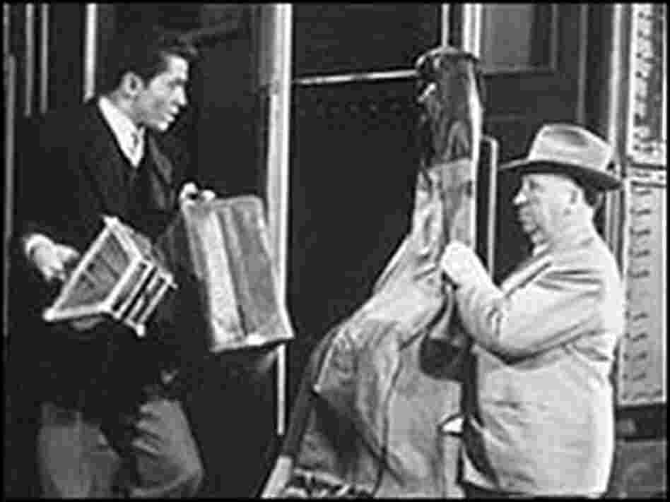 Farley Granger and Alfred Hitchcock in Strangers on a Train