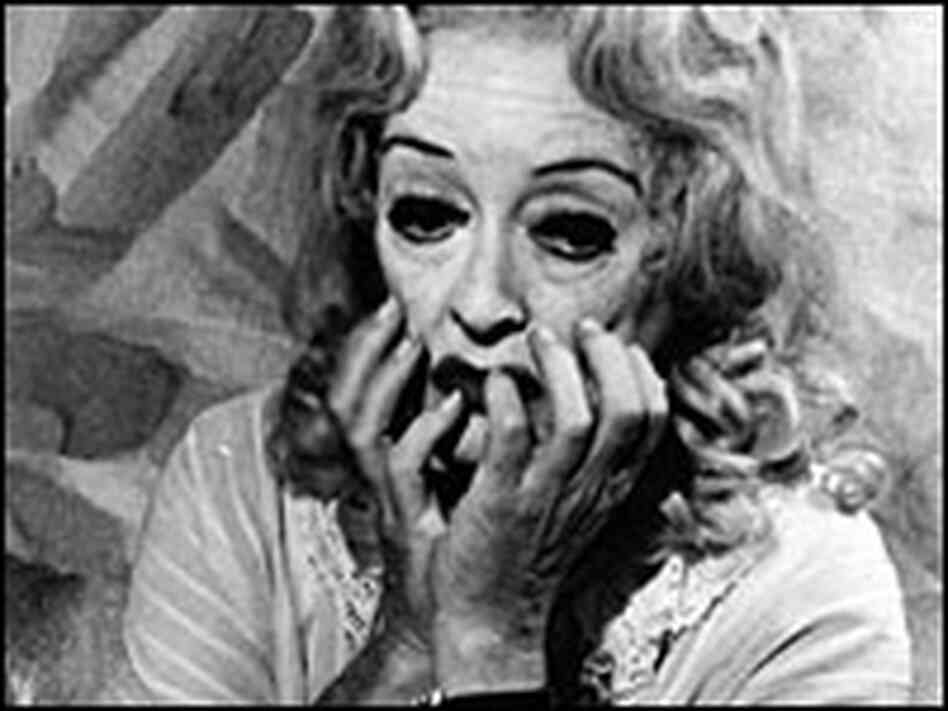 Bette Davis (and Joan Crawford, in enlargement) on the beach