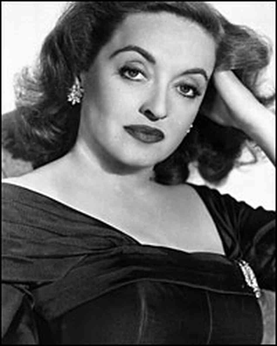 Bette Davis looks provocatively at camera
