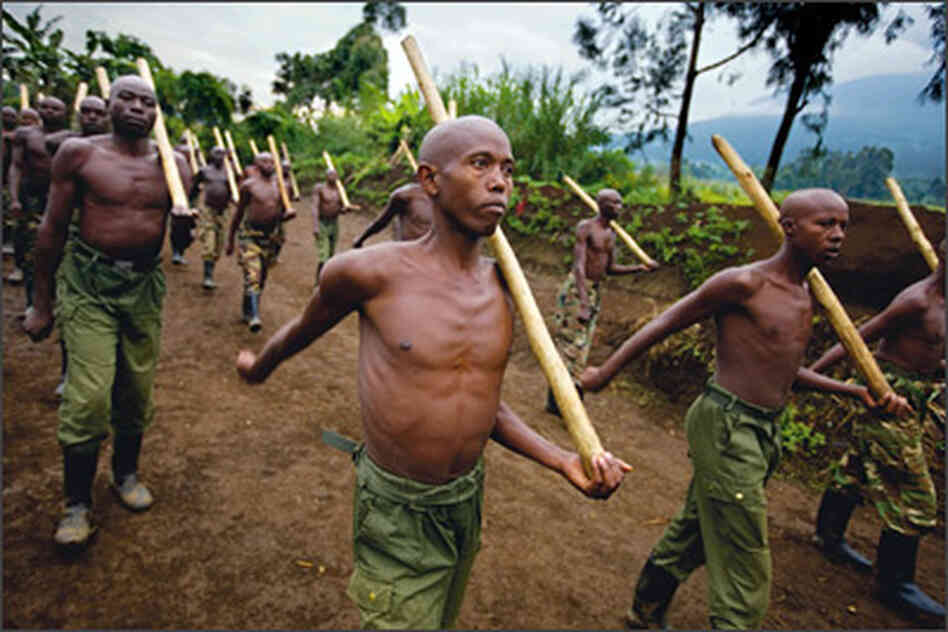 Rebel Tutsi fighters train in Virunga National Park. Rebel Tutsi fighters train in Virunga National Park.
