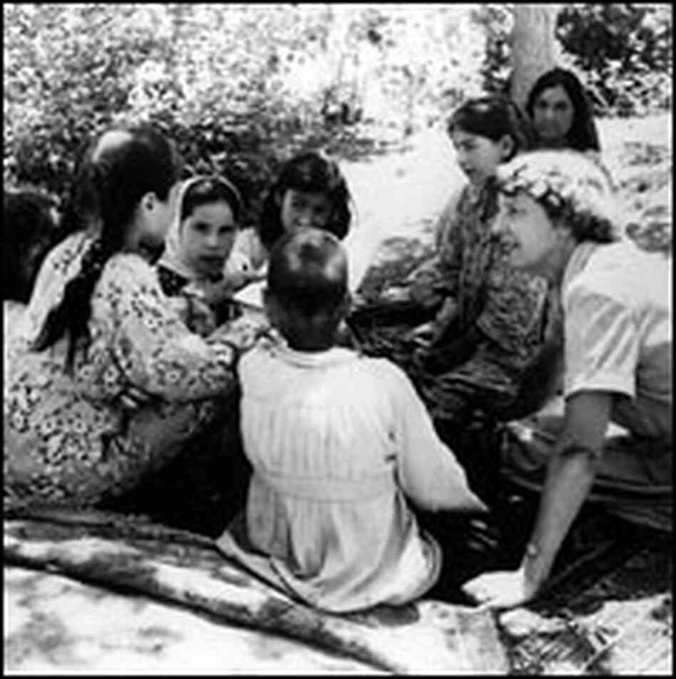 Helen with Iranian villagers in the 1950s. Helen with Iranian villagers in the 1950s.