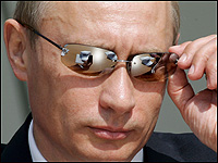 Russian President Vladimir Putin looks at demonstration flights.