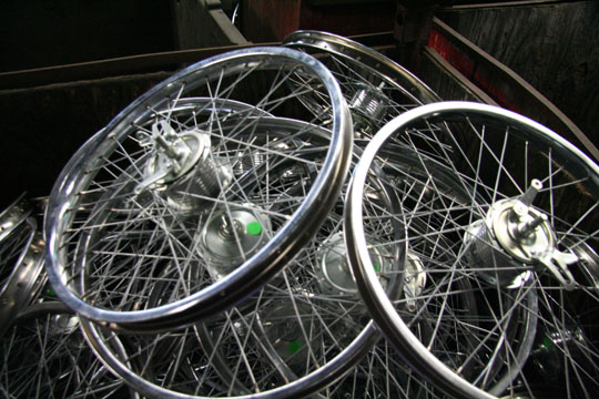 Heavy-duty wheels for bicycles, tricycles and carts made by Worksman Cycles.