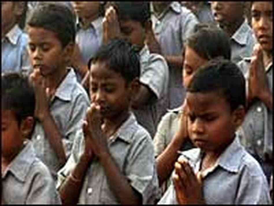 Children at a prayer meeting in India