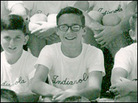 Host Scott Simon at Camp Indianola in 1964. Host Scott Simon at Camp Indianola in 1964.