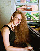 Deanna Witkowski, at the piano.
