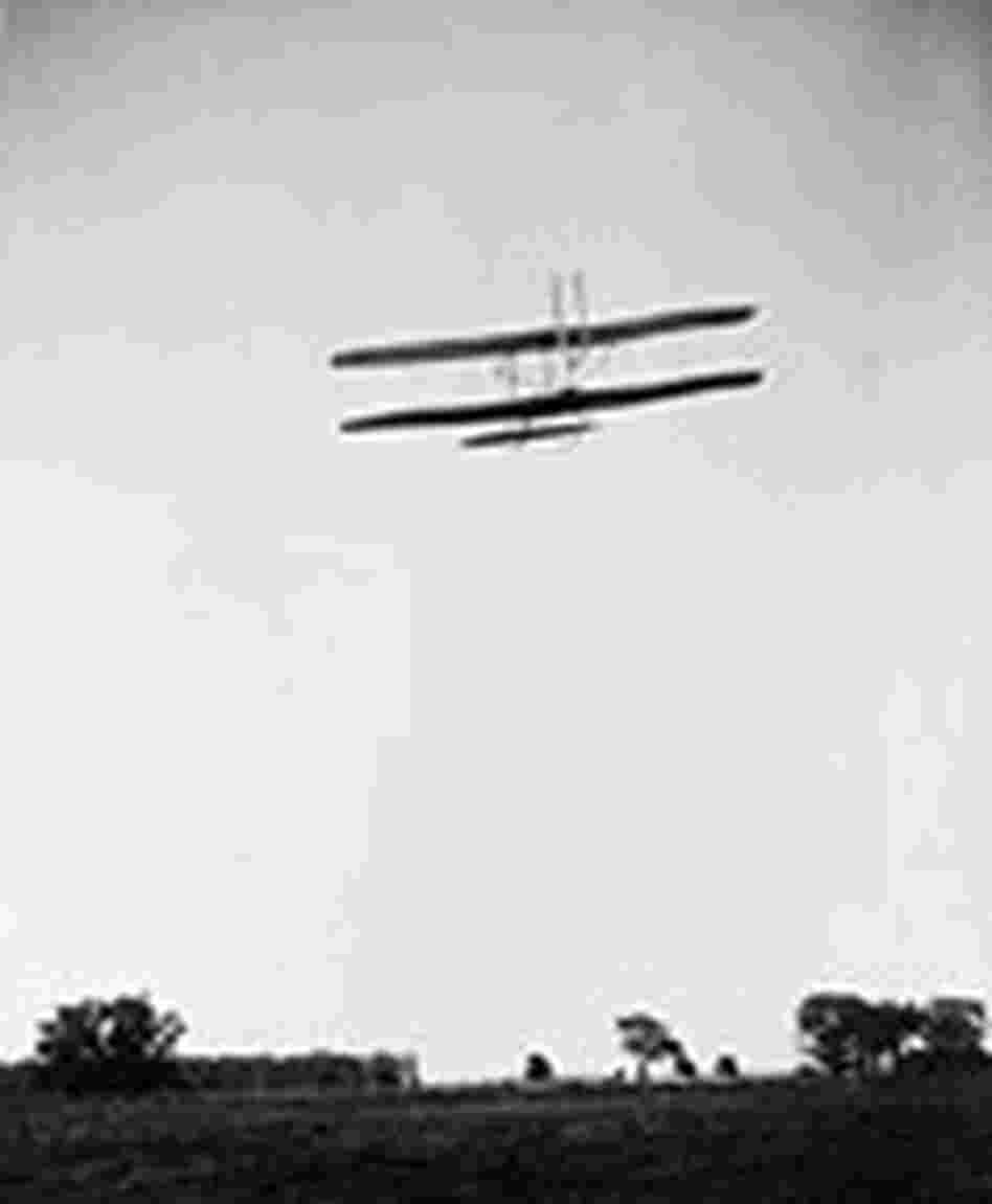 Orville Wright flying over Huffman Prairie. Orville Wright flying over Huffman Prairie.