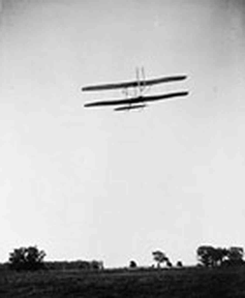 Orville Wright flying over Huffman Prairie. Orville Wright flying over Huffman Prairie.