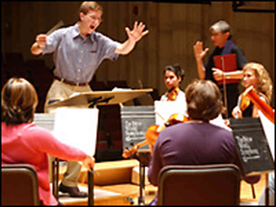 Members of the New World Symphony rehearse. Members of the New World Symphony rehearse.