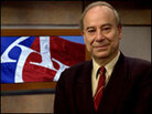 Akbar Ahmed in front of an American University banner. Akbar Ahmed in front of an American University banner.