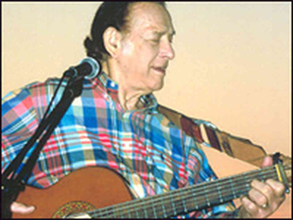 Oscar Brand performs at Great Neck, NY, in 2001. Oscar Brand performs at Great Neck, NY, in 2001.