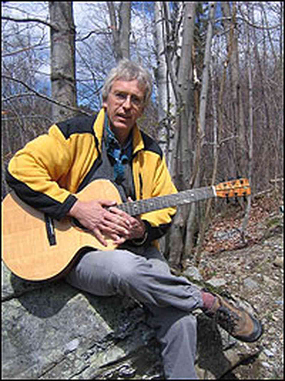 Tim Brookes and his new guitar. Tim Brookes and his new guitar.