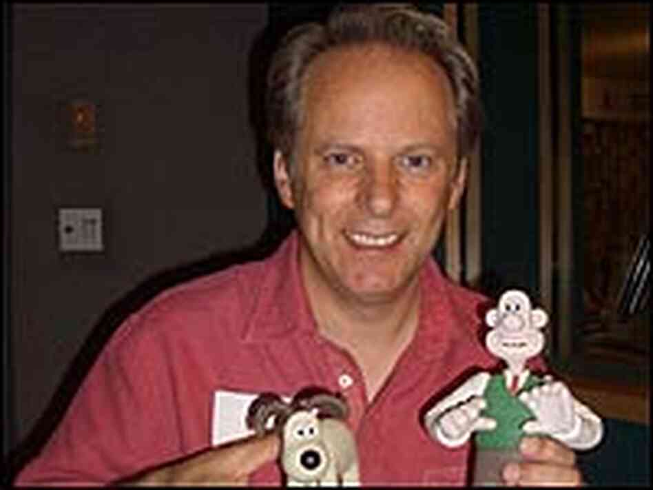 Nick Park holds a Wallace figurine. Nick Park holds a Wallace figurine.
