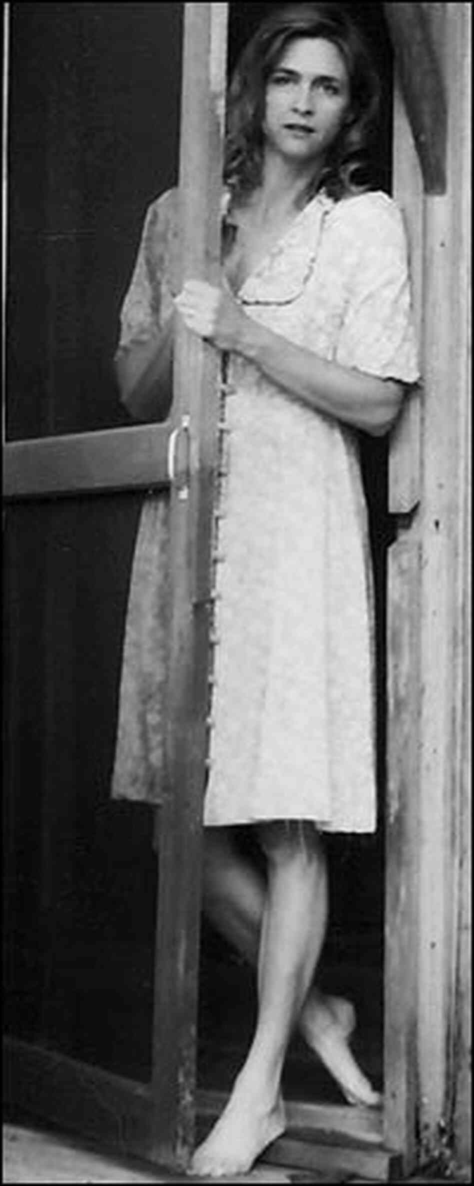Minton Sparks in the doorway of a home. Minton Sparks in the doorway of a home.