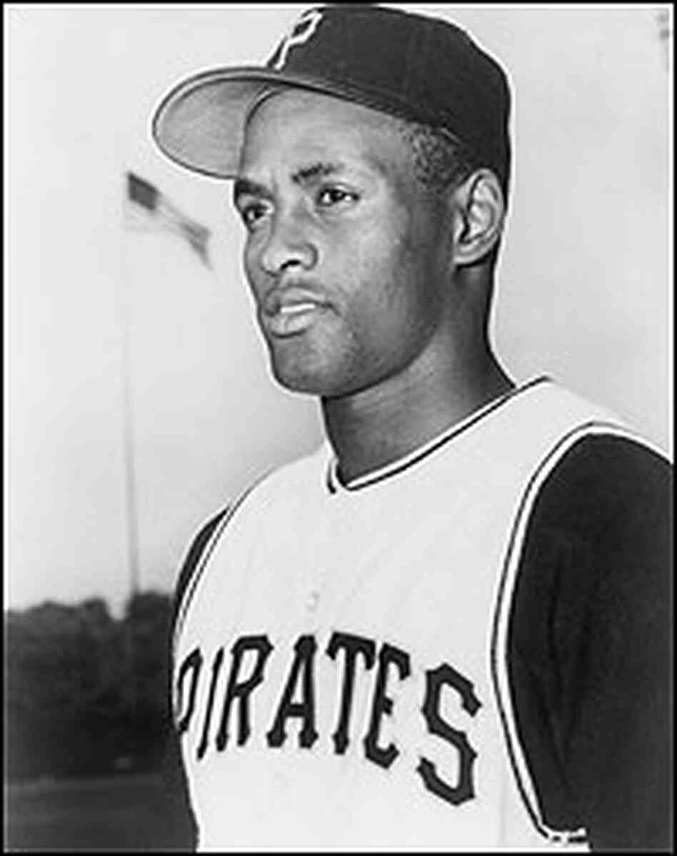 Roberto Clemente in baseball cap and uniform as a Pittsburgh Pirate rookie in 1955. Roberto Clemente in baseball cap and uniform as a Pittsburgh Pirate rookie in 1955.