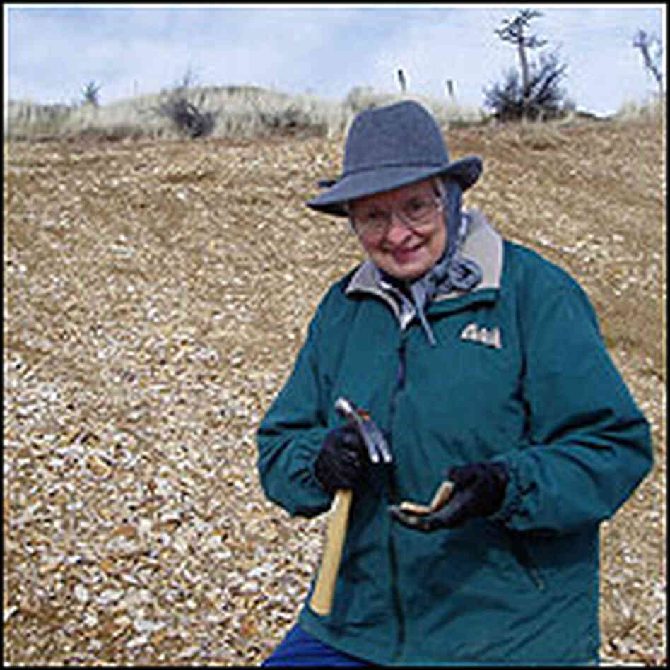 Karen Masshoff, with fossil digging tools.