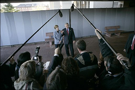 President Bush and Laura Bush meet with the press at Walter Reed Army Medical Center in 2004.