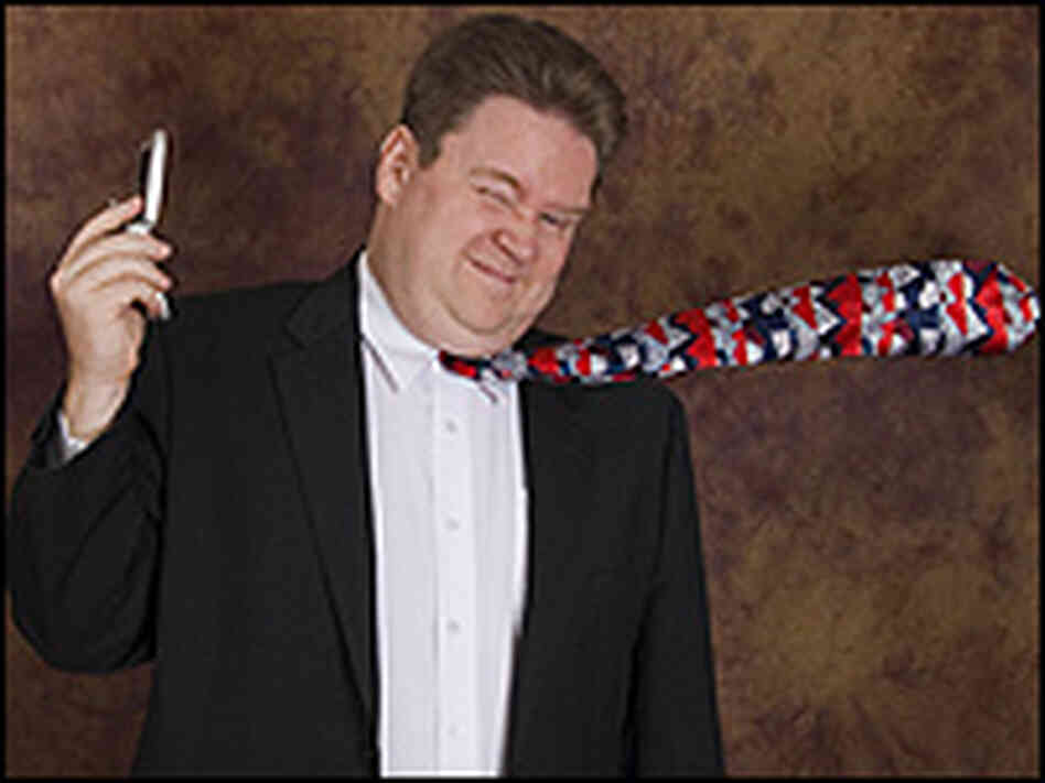 Man's holding cell phone away from ear and tie being blown by force of sound from phone. Man's holding cell phone away from ear and tie being blown by force of sound from phone.