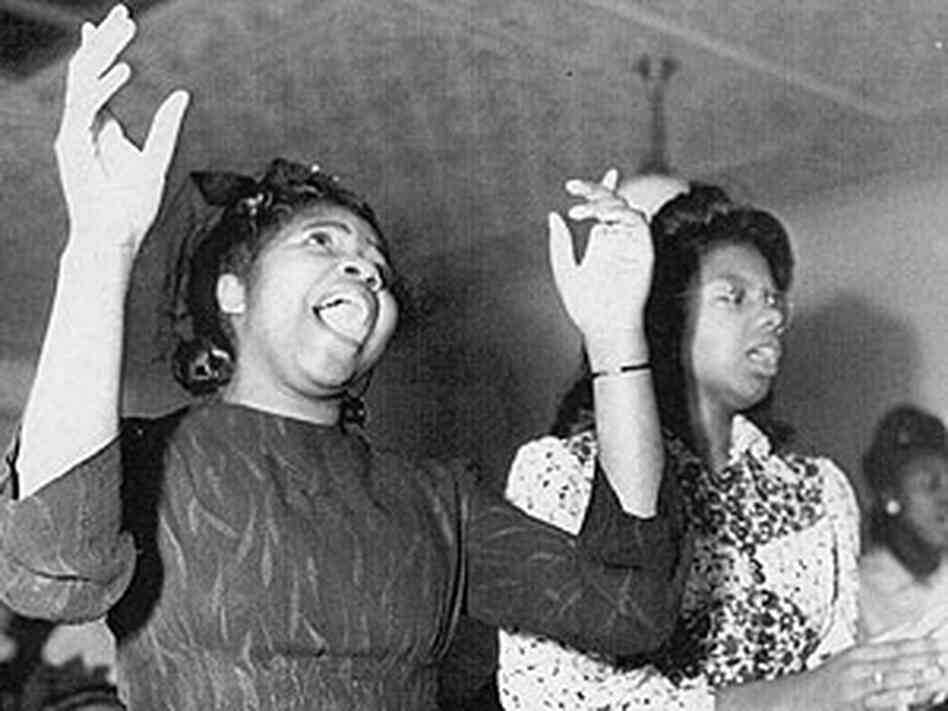 Women sing in church in Washington, D.C. Women sing in church in Washington, D.C.