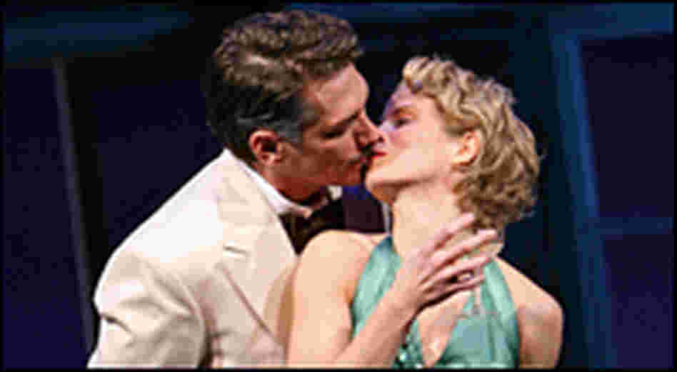 Paulo Szot kisses Kelli O'Hara