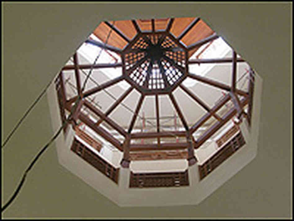 AUC features a series of small courtyards with balcony spaces and intricate wooden lattice work.