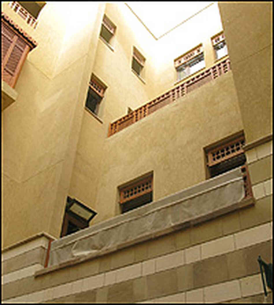 Offices buildings feature mashrabiya, or wooden window screens.