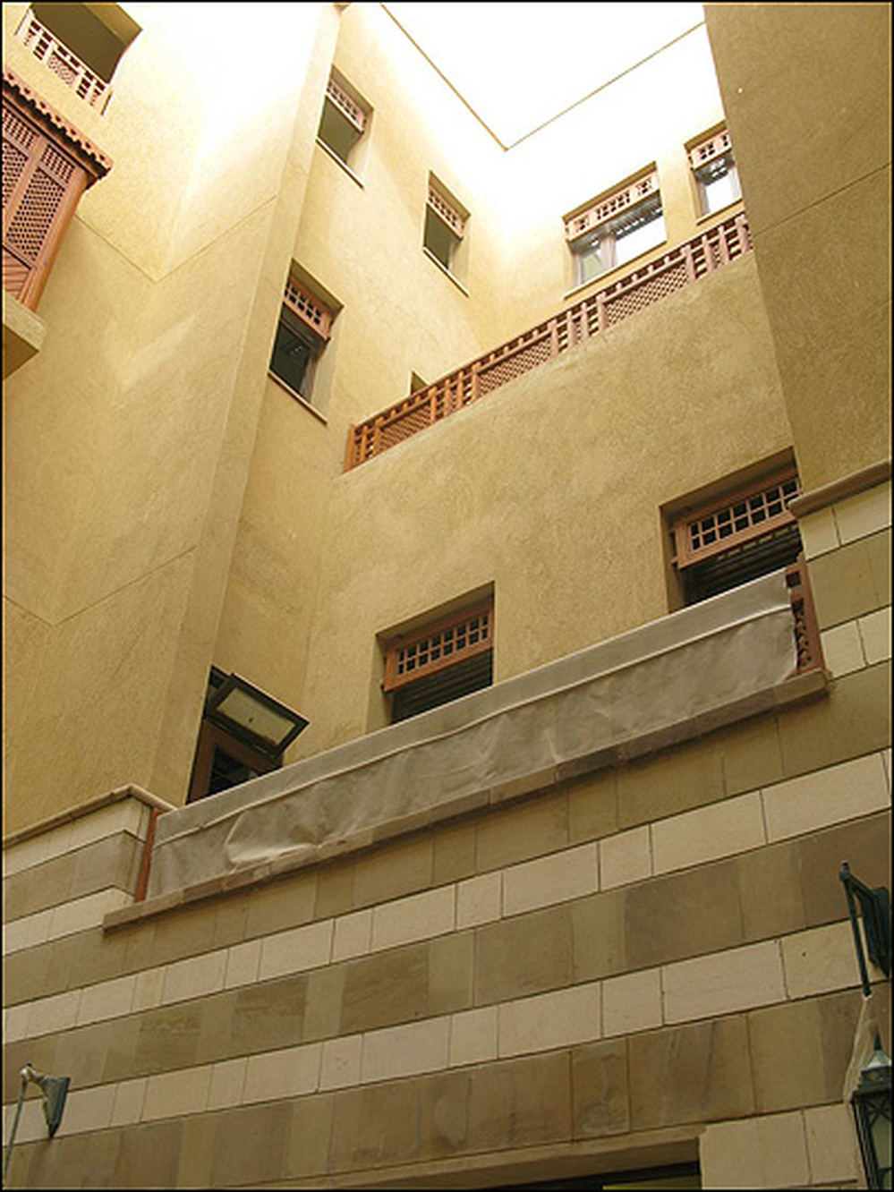Offices buildings feature mashrabiya, or wooden window screens.