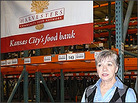 CEO Karen Haren stands in an empty warehouse run by Harvesters, a community food network. CEO Karen Haren stands in an empty warehouse run by Harvesters, a community food network.