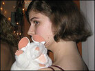 Librarian Elizabeth Bird, with a white stuffed mouse on her shoulder. Librarian Elizabeth Bird, with a white stuffed mouse on her shoulder.