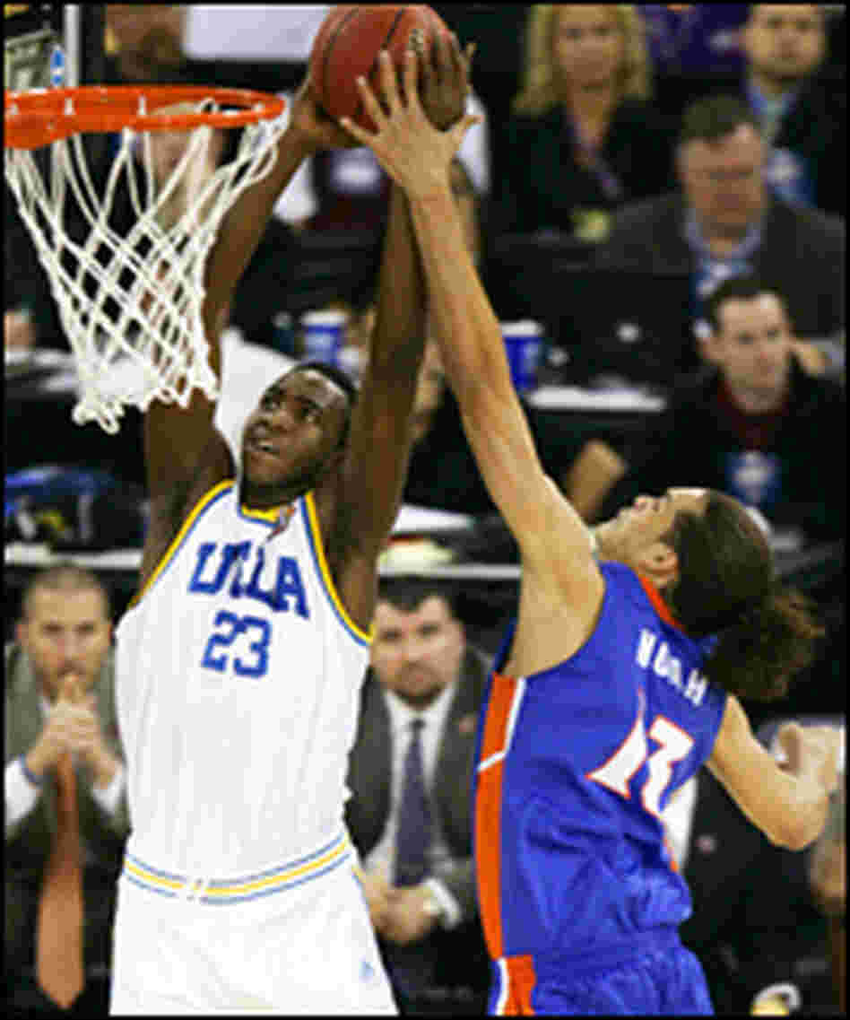 Joakim Noah of Florida blocks a UCLA shot