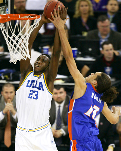 Joakim Noah of Florida blocks a UCLA shot