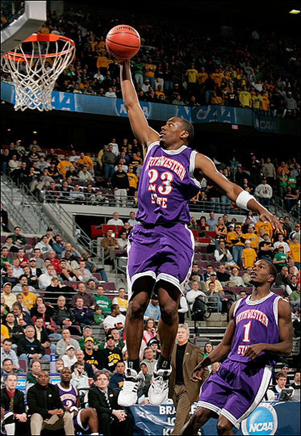 Jermaine Wallace of Northwestern State soars for a lay-in.