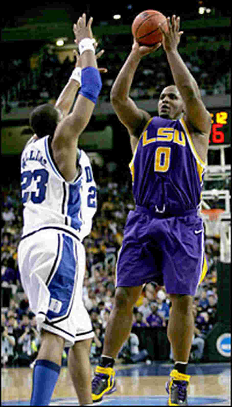 Glen Davis of LSU puts up a jump shot against Shelden Williams of Duke.