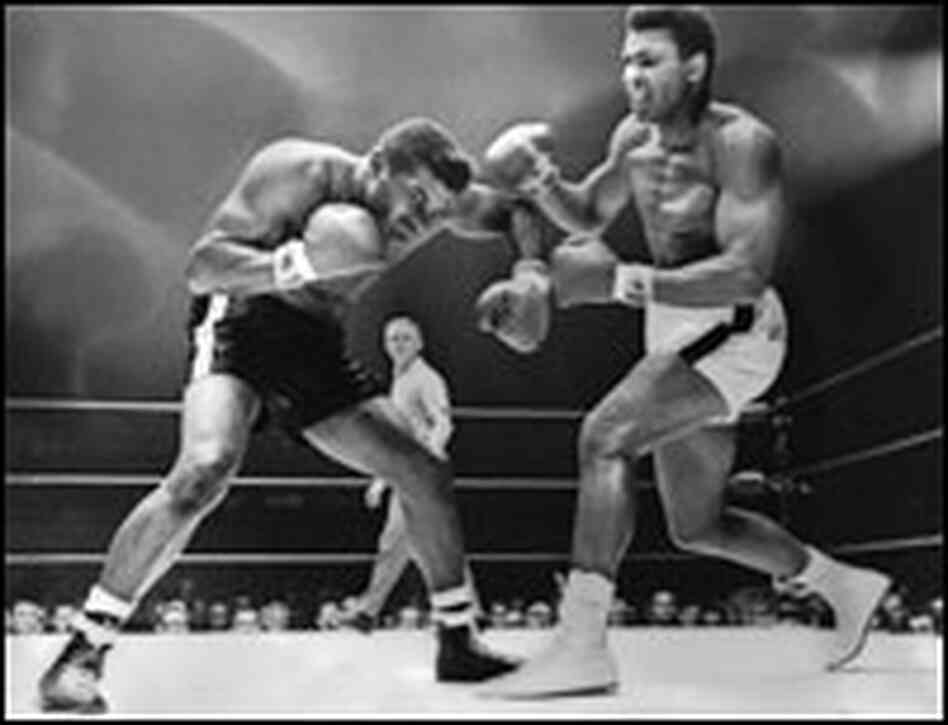 Cassius Clay (Muhammad Ali) spars with challenger Floyd Patterson in 1965.