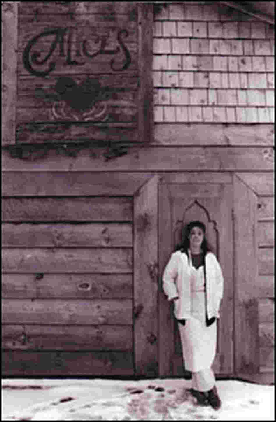Alice Brock stands outside of her restaurant, made famous in Arlo Guthrie's 1967 song.