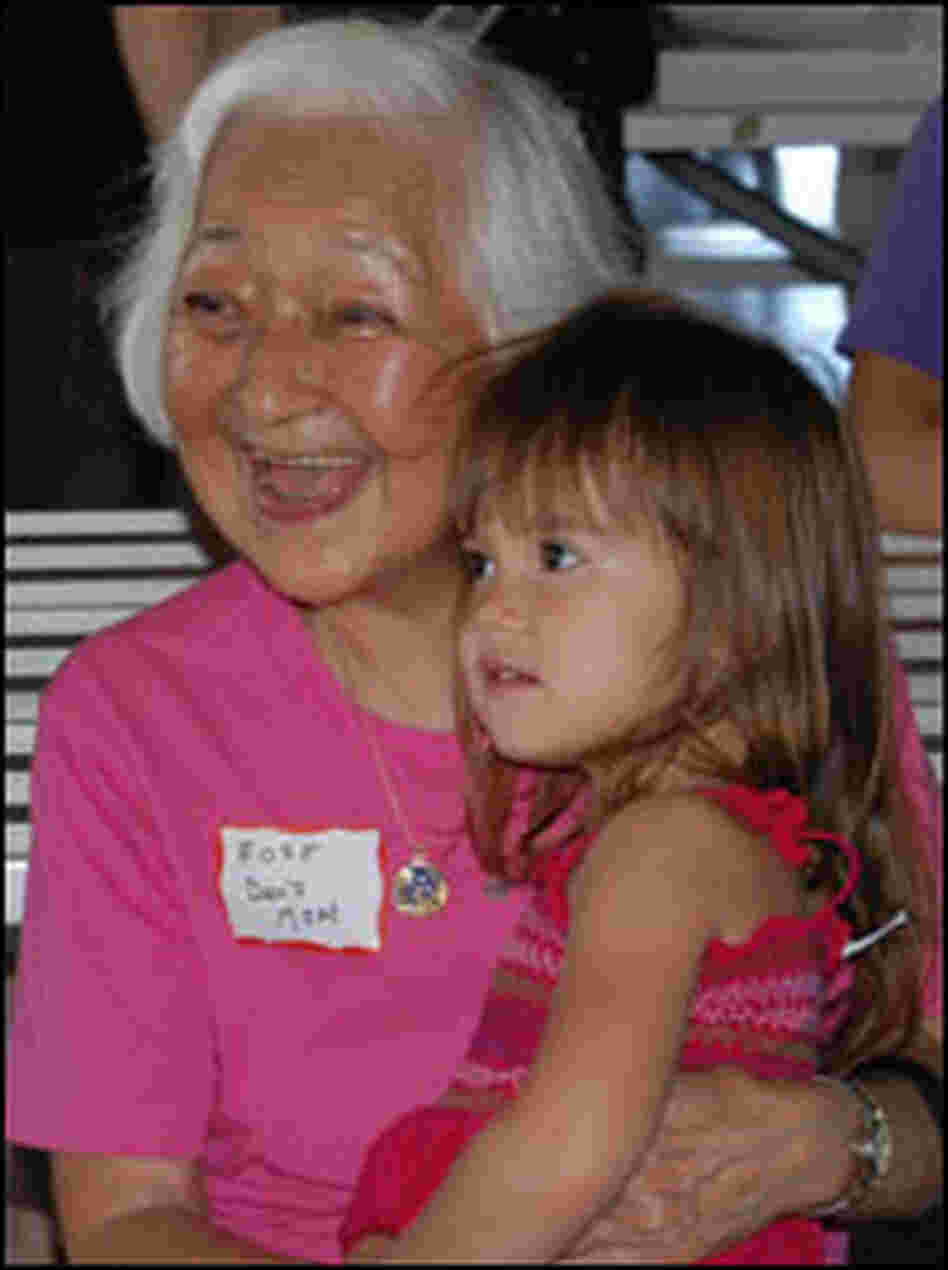 Rose Tani, Dan's mother, looks on with her granddaughter at Dan's launch in Oct. 2007. Rose Tani, Dan's mother, looks on with her granddaughter at Dan's launch in Oct. 2007.