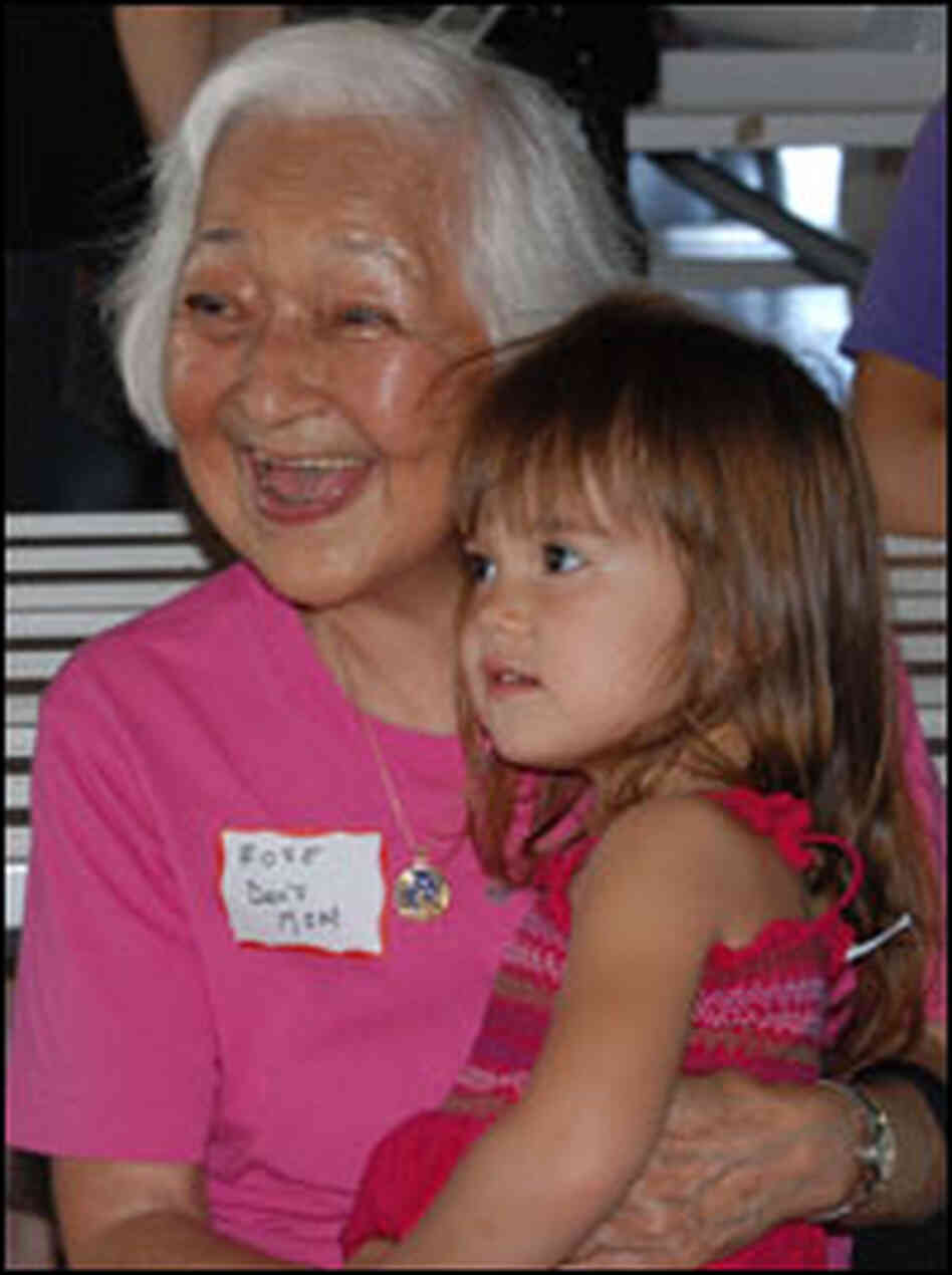 Rose Tani, Dan's mother, looks on with her granddaughter at Dan's launch in Oct. 2007. Rose Tani, Dan's mother, looks on with her granddaughter at Dan's launch in Oct. 2007.