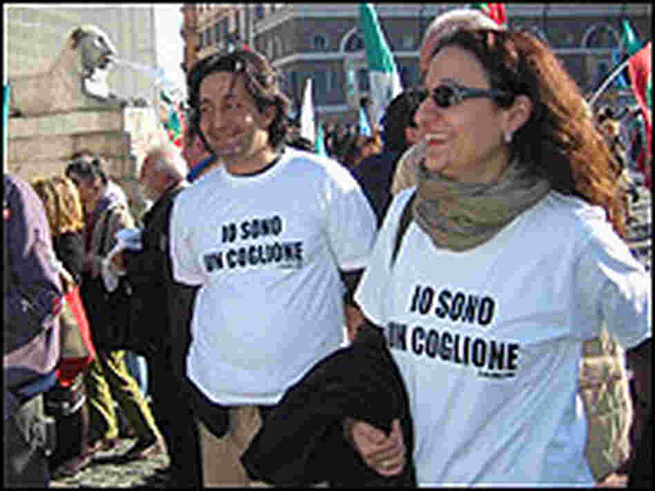 Prodi supporters wear T-shirts that say 'I'm a Moron.'