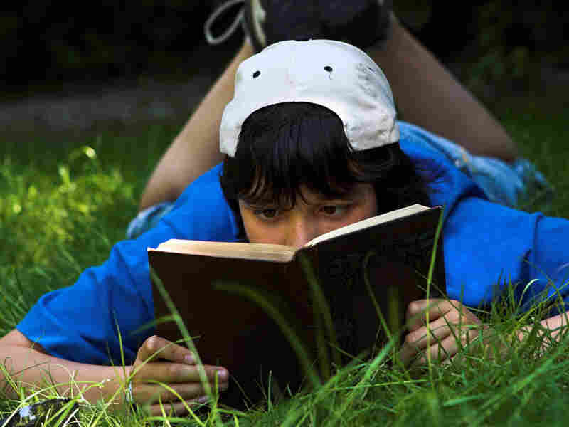 Teen Boy Reading Poetry