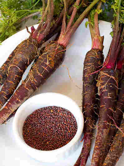 Black carrots and whole mustard seed, two main ingredients for making kanji.