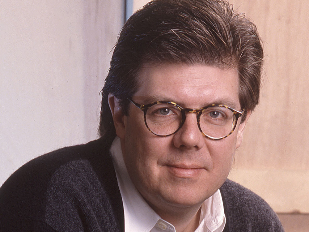 John Hughes, shown above in 1990, was the director of <em>Sixteen Candles</em>, <em>The Breakfast Club</em> and <em>Ferris Bueller's Day Off</em>. His work matched heartfelt explorations of teen angst with truly memorable comedy. (Getty Images)