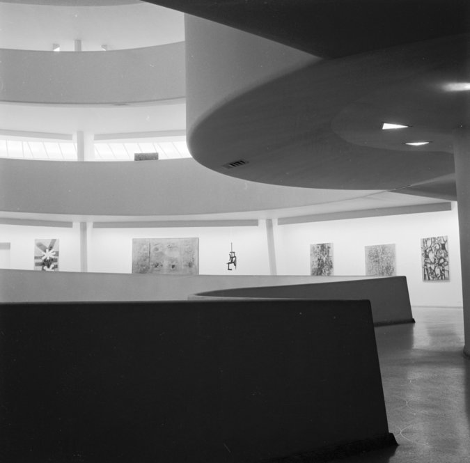 The interior of the Guggenheim in 1955. The museum's concrete rings allow light into the building to display exhibits to their full potential. 