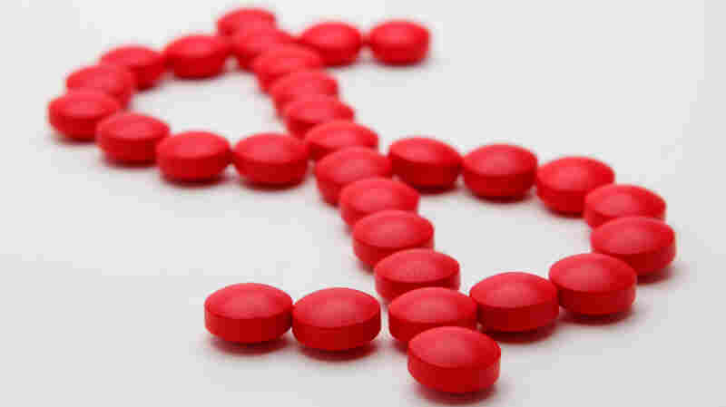 dollar sign made of pills