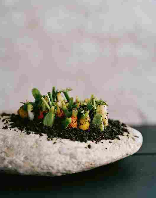 Vegetable Field: The "soil" in this dish is made of malt, hazelnut and regular flour, sugar, lager, salt and butter — and takes two days to create.