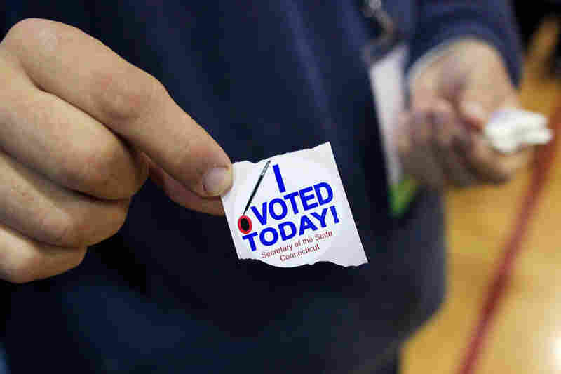 A poll worker handed out these stickers after voters cast their ballots at the North Street School in Greenwich, Conn. 