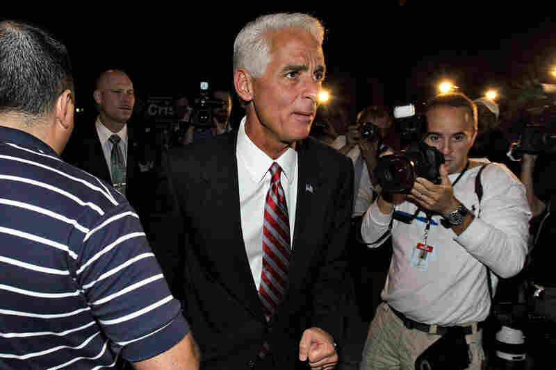 Florida Gov. Charlie Crist, a former Republican who ran for the Senate as an independent, makes his way to vote in St. Petersburg, Fla. Crist lost to Republican newcomer Marco Rubio. 