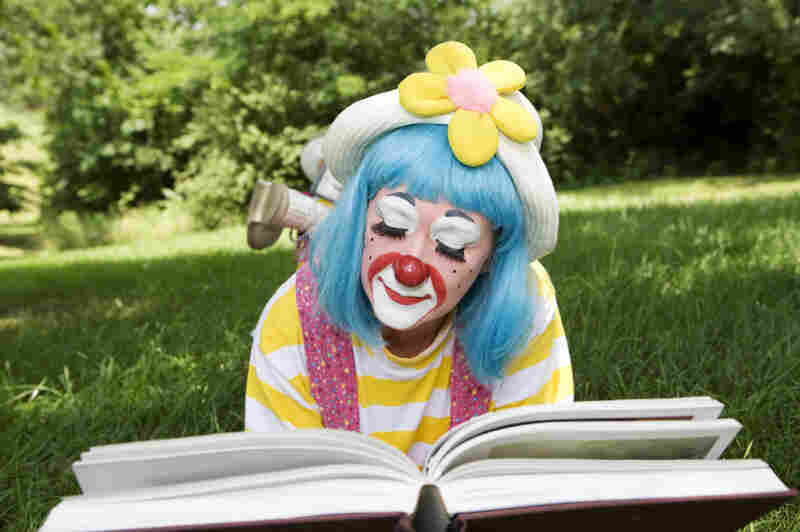 Clown reading