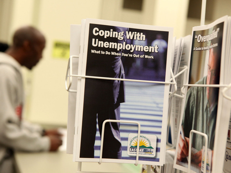 Pamphlets with information about unemployment are displayed in a career center in Oakland, Calif. (Justin Sullivan/Getty Images North America)