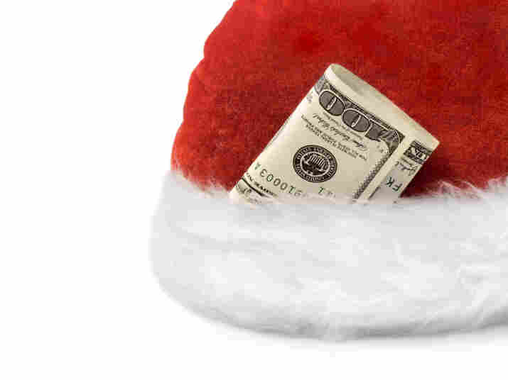 A santa hat with money stuffed in it