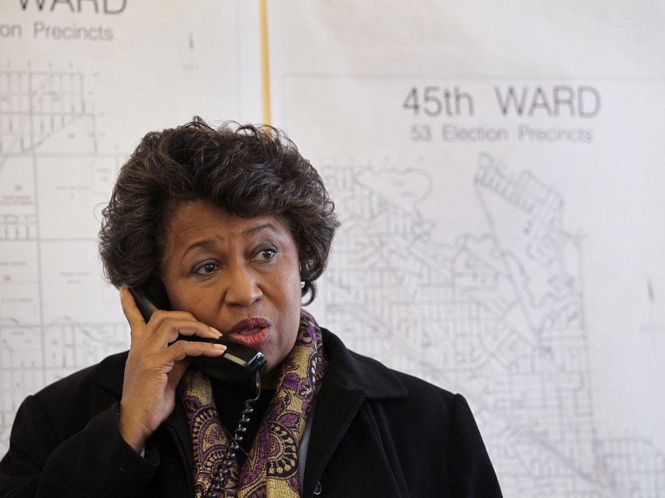 Former U.S. senator Carol Moseley Braun takes a call following a press conference at her campaign headquarters in Chicago, Illinois. Braun was recently endorsed in her run for mayor by prominent black Chicago leaders. (Scott Olson/Getty Images)